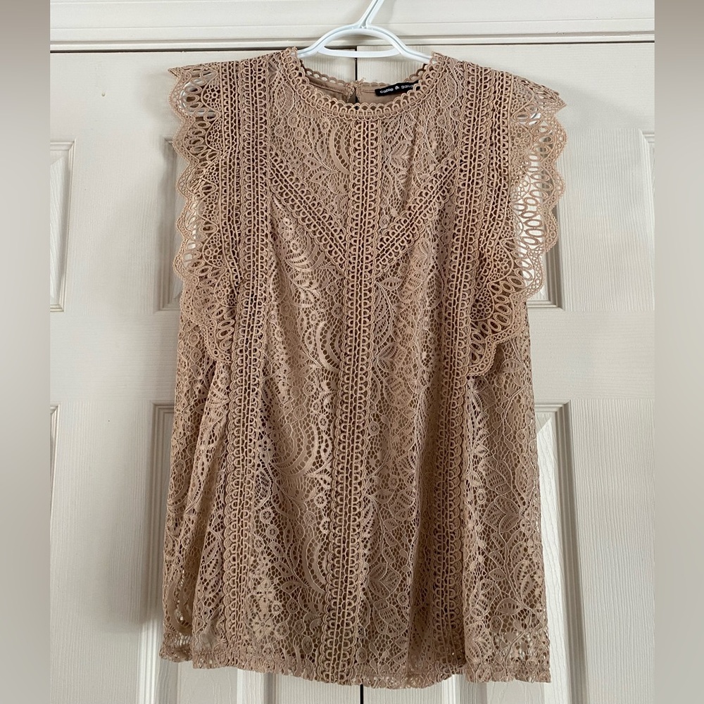 Great condition sleeveless Blouse never worn